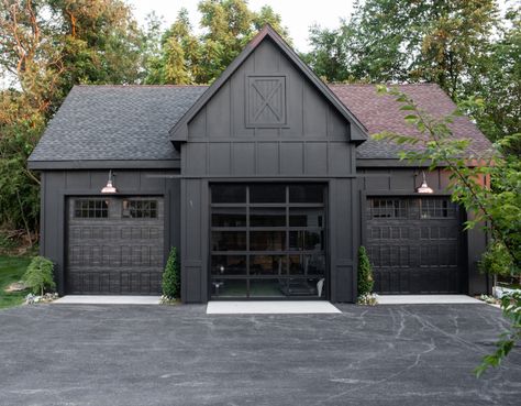 Sherwin Williams Tricorn Black Modern Farmhouse Detached Garage painted in Sherwin Williams Tricorn Black Sherwin Williams Tricorn Black Modern Farmhouse Detached Garage painted in Sherwin Williams Tricorn Black Sherwin Williams Tricorn Black Modern Farmhouse Detached Garage painted in Sherwin Williams Tricorn Black #SherwinWilliamsTricornBlack #ModernFarmhouse #DetachedGarage #SherwinWilliams Black Exterior Garage, Black Garage White House, Modern Farmhouse Detached Garage, Black Houses Modern, Black Garage, Black Modern Farmhouse, Farmhouse Garage, Building A Storage Shed, Pole Barn Garage