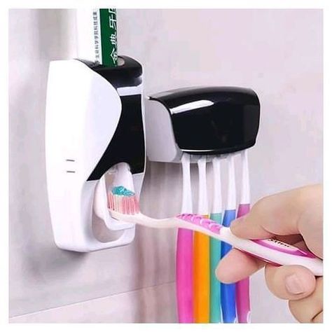 It a picture of a toothpaste dispenser and brush holder Wall Mounted Toothbrush Holder, Toothbrush And Toothpaste Holder, Sikat Gigi, Toothpaste Squeezer, Toothbrush Storage, Bathroom Gadgets, Toothpaste Holder, Toothbrush Toothpaste, Bathroom Toothbrush Holder