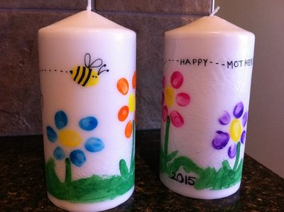 These art candles are fun and easy to make and make a perfect Mother's Day gift! Fingerprint flowers and bees adorn the brightly painted candles wrapped in creativity of loved ones! Kids Candles, Diy Mother's Day Crafts, Mother's Day Projects, Mother Day Wishes, Diy Gifts For Kids, Mothers Day Crafts For Kids, Painted Candles, Daycare Crafts, Candle Craft