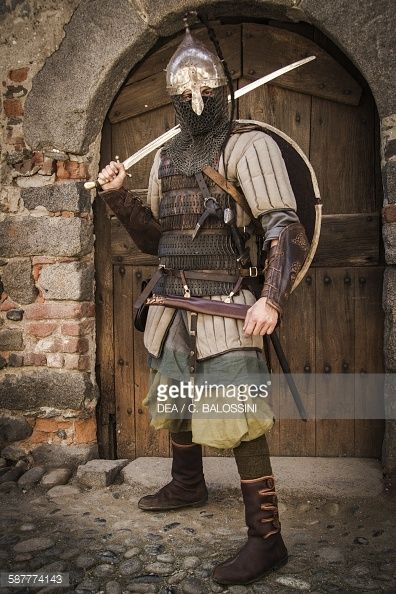 Viking warrior with helmet leather armour and gambeson sword and shield 10th century Historical reenactment Leather Armour, Viking Armor, Historical Armor, Historical Reenactment, Leather Armor, Norse Vikings, Knight Armor, Arm Armor, Medieval Armor