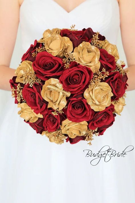 This is a round brides bouquet with dark red and gold glitter roses accented with gold berries. All of our wedding bouquets are made with artificial wedding flowers. Beauty And The Beast Quince, Gold Wedding Bouquets, Beauty And The Beast Wedding Theme, Red Gold Wedding, Gold Wedding Flowers, Beauty And Beast Wedding, Blush Bouquet Wedding, Gold Bouquet, Beauty And The Beast Theme