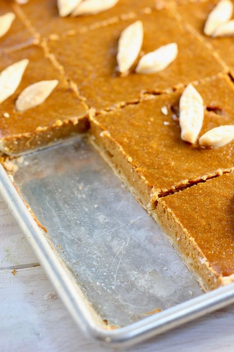 This delicious & simple sheet pan pumpkin pie is a new twist on an old classic! Cooked & served on a sheet pan, it serves a crowd of 20-24 people. #thanksgiving #pumpkinpie #slabpie #pumpkin #sheetpan #easydessert #thanksgivingdessert #dessertforacrowd Sheet Pies Thanksgiving, Pumpkin Pie Squares Easy, Pumpkin Sheet Pie Recipe, Sheet Pumpkin Pie, Pumpkin Pie In A Sheet Pan, Pumpkin Pie Sheet Pan Recipe, Sheet Pan Pumpkin Pie Recipe, Pumpkin Pie Sheet Cake, Pumpkin Sheet Pie