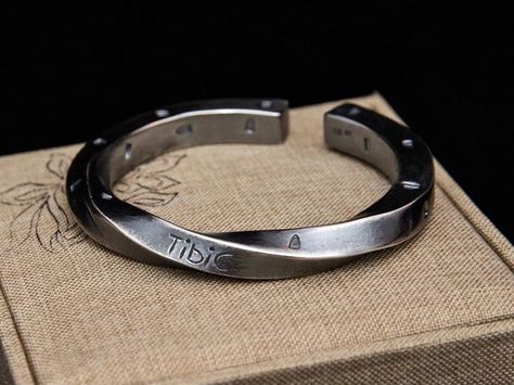 He'll love this #ethical and #fairtrade chunky silver Viking bracelet! It is an authentic Tibetan Buddhist engraved bracelet for men and one of the top selling items on Etsy. Click to learn more about the #TibiCollection's #ecofriendly and #zerowaste ethical business practices! #EthicalGifts #GiftsForHim #BuddhistJewelry (Meaningful Gifts for the Man Who Has Everything | Ethical Gift Ideas | Support Small Businesses | Buddhist Jewelry | Fine Jewelry Stores Online | Handmade Jewelry Designers) Mens Silver Cuff Bracelet, Silver Mens Bracelet, Buddhist Jewelry, Oxidized Silver Bracelet, Mens Bracelet Personalized, Bracelet Valentines, Bracelet For Him, Mens Cuff Bracelets, Twist Bracelet