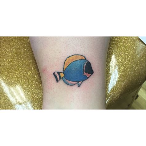 A blue tang tattoo to represent Dory Blue Tang Tattoo, Nemo And Dori Tattoo, Finding Nemo Matching Tattoos, Baby Dory Tattoo, Dory Tattoo Small Just Keep Swimming, Blue Tang, Tattoo Idea, Future Tattoos, Print Tattoos