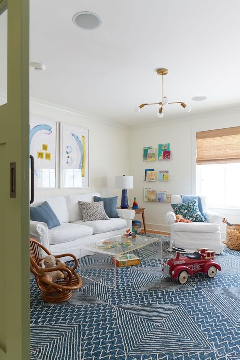 Playroom With Sitting Area, Window Cubby Ideas, Game Nook In Living Room, Rh Playroom, Multiage Playroom, Playroom Living Room Combo Layout, Family Den Ideas, Playroom Family Room Combo, Loft Playroom Ideas Upstairs