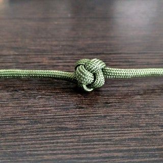 Celtic Button Knot (with Pictures) - Instructables Celtic Button Knot, Celtic Knots Diy, Leather Wrap Bracelet Tutorial, Celtic Knot Tutorial, Lanyard Knot, Paracord Bracelet Instructions, Wrapping Tips, Button Knot, Fishermans Knot