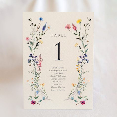 Modern Bright Wedding Invitations, Wedding Table Decorations Wild Flowers, Spring Wedding Place Cards, Wild Flower Wedding Invitations, Wildflower Wedding Table Decor, Wedding Table Assignment Ideas, Floral Wedding Signage, Wildflower Wedding Table, Wedding Table Assignments