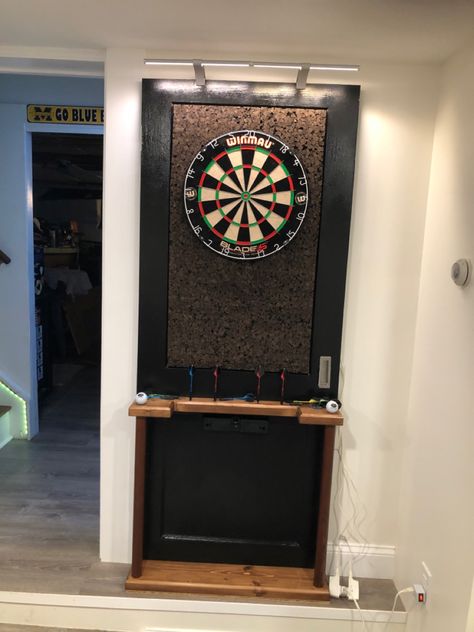 Dart Board Area Ideas, Indoor Dart Board Wall, Dart Board Set Up, Modern Dart Board Wall, Dart Room Ideas, Electronic Dart Board Cabinet, Dart Board Wall Ideas, Diy Dart Board, Dartboard Stand Diy