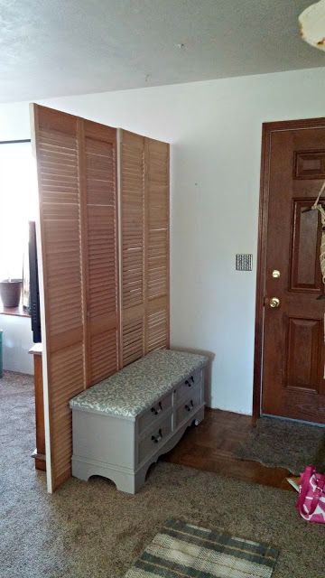 How to build a fake entryway foyer with window shutters Fake Foyer Entryway, Entryway Privacy Ideas, How To Fake An Entryway When You Dont Have One, Faux Entryway Ideas, Fake Entryway Ideas, Foyer With Window, Fake Entryway, Entry Divider, Living Room Entryway No Foyer