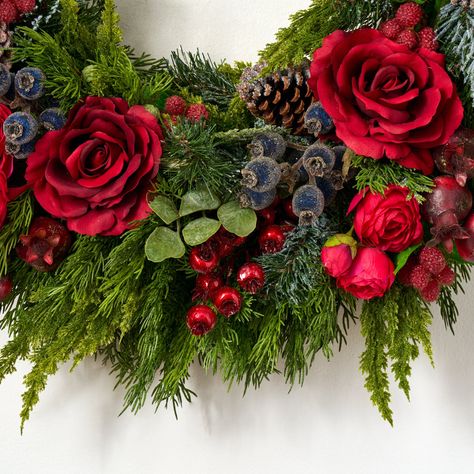 Available in: 26" Diameter x 6" Deep 30" Diameter x 6" Deep Lifelike Floral & Botanical Indoor or Outdoor Covered Use Designed, Handcrafted in Ohio Shown in Size 26" Wreath Only; Garland and Accessories Sold Separately Coordinating Collection: Arrangement: AR1565 Garland: GAR1109 The Holiday Season is a splendid time of year to spruce up your home with a beautiful wreath. Our Red Queen Rose & Mixed Winter Berry Classic Holiday Front Door Mantle Wreath is the perfect statement piece for the front Red Rose Christmas Wreath, Mantle Wreath, Holiday Front Door, Fall Tabletop Decor, Halloween Stem, Christmas Stem, Rosé Christmas, Winter Berry, Door Wreaths Diy