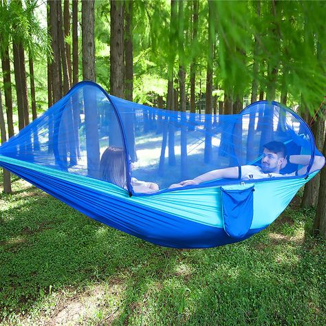 PRICES MAY VARY. ✔️【Parachute Material Camping Hammock】: portable camping hammock with Mosquito net is made with , highly quality 210T parachute nylon and special designed durable bug net fabric which are more durable, 8.2*3.9 ft (250*120 CM), large size is more comfortable, can hold the weight up to 400 pounds. ✔️【Portable Hammock】: Super lightweight and portable, Specially designed compact carrying bag can be used to store small items，Mobile phones, keys, glasses, etc. It is a great replacemen Hammock With Mosquito Net, Tenda Camping, Insect Netting, Portable Hammock, Camping Needs, Outdoor Hammock, Camping Hammock, Double Hammock, Anti Mosquito