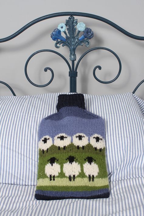 Flock Of Sheep Hot Water Bottle Pachamama hand knitted wool hot water bottle cover, perfect for lounging, includes 2L hot water bottle. White sheep farm animal pattern. Fair trade and handmade in Nepal. Flock Of Sheep, Knitting Group, Water Bottle Covers, Hot Water Bottle Cover, Handmade Fair, Sheep Farm, Winter Walk, Wool Wash, Hot Water Bottle