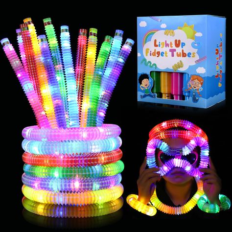 PRICES MAY VARY. 【Bulk Glow Sticks】The box include 24 pcs glow sticks, which is about 8.3" long and stretch to 25". Spice up your glow parties with these glow in the dark party decorations 【Kids Party Favors】These glow sticks are great party favors for kids 8-12 and 4-8. There is a light switch button on the top of the pop tubes, press the button to switch 3 modes of light, which is perfect for glow party, easter party, 4th of July party and etc. It's made of high-quality plastic material and BP Glow Sticks Party, Minecraft Pinata, Glow Party Favors, Toddler Party Favors, Goodie Bag Stuffers, Return Gifts For Kids, Glow Stick Party, Glow In Dark Party, Glow Party Supplies