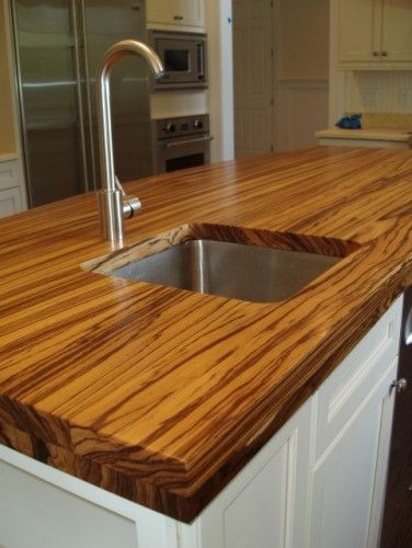 Definitely different zebra wood countertop Butcher Block Kitchen Countertops, Hardwood Countertops, Classic Farmhouse Kitchen, Diy Butcher Block, Block Countertops, Wood Countertops Kitchen, Countertops White, Butcher Block Kitchen, Kitchen Counter Top