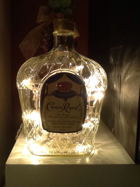 Crown Royal bottle light Crown Royal Bottle Centerpiece Ideas, Crown Royal Bottle Centerpiece Weddings, Crown Bottle Centerpieces Wedding, Crown Royal Bottle, Crown Bottle, Bottle Centerpieces, Painting Glass, Wedding Bottles, Table Wedding