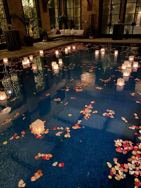 Pool Party Decorations Night Time, Pool Filled With Flowers, Pool Decorations For Engagement Party, Candles In Pool Wedding, Candles In Pool Floating, Pool At A Wedding, Wedding Pool Floating Decorations, Wedding Pool Lanterns, On The Water Wedding Ideas