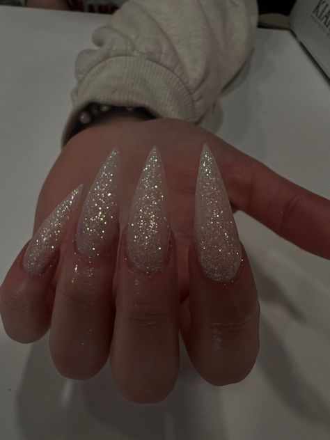 Glitter Stilletos Nails, Christmas Nails Sparkly Silver Glitter, Pointy Nails Christmas, Short Stilleto Nails Glitter, Christmas Nails 2023 Stiletto, White Sparkly Winter Nails, Prom Stilleto Nails, Silver Crystal Nails, Glitter Stilleto Acrylic Nails