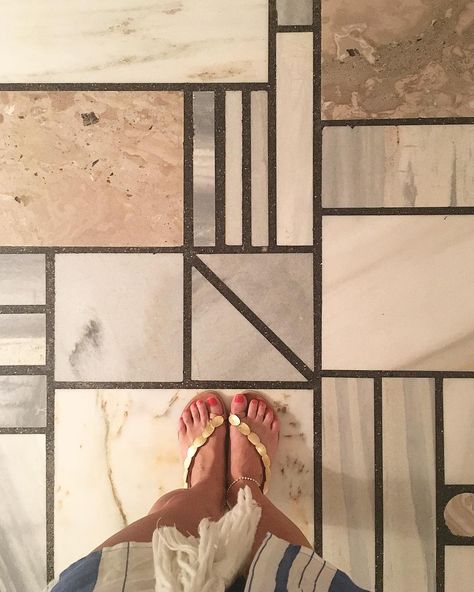 "Windy City Rehab" host Alison Victoria mixes and matches different types — like marble and ceramic — and different finishes into unique patterns. Windy City Rehab, Leftover Tile, Alison Victoria, Tiles Ideas, Diy Tile, Diy Flooring, Windy City, Home N Decor, Backyard Decor