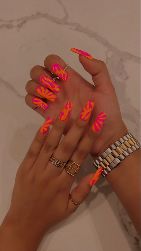 Pink And Orange Gel Nail Designs, Magenta Orange Nails, Punk And Orange Nails, Hot Pink And Orange Nails Acrylic, Illuminous Nails, Orange Spring Nails Acrylic, Hot Pink And Orange Nail Designs, Orange And Pink Marble Nails, Orange And Magenta Nails