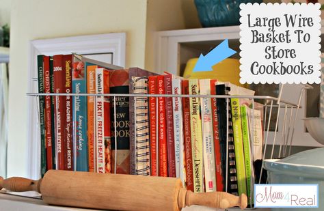 large wire basket to store cookbooks keeps on top of refrigerator.  Mom4Real Top Of Refrigerator Storage, Top Of Fridge, Cookbook Display, Large Wire Basket, Cookbook Storage, Top Of Refrigerator, Fridge Decor, Pantry Closet, Fridge Storage