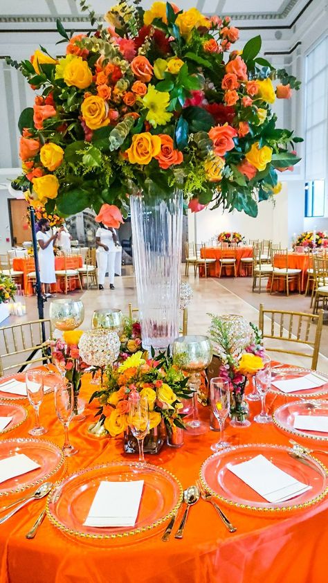 Orange Floral Centerpiece Wedding, Orange Flower Table Arrangements, Red Orange Yellow Wedding Decor, Yellow Orange Flower Arrangement, Red Orange Yellow Flower Arrangement, Rustic Chic Wedding Decor, Yellow Wedding Decorations, Hunter Wedding, Orange Table