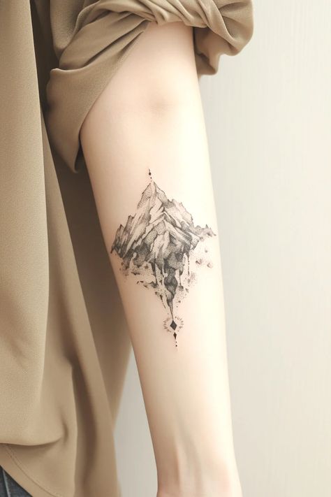 30 Small Mountain Tattoo Designs to Inspire Your Next Ink – Refined Aesthetique Mountain Thigh Tattoo, Small Mountain Tattoo, Mountain Tattoos, Mountain Tattoo Design, Calf Tattoo, Mountain Tattoo, Ankle Tattoo, Thigh Tattoo, Arm Tattoo