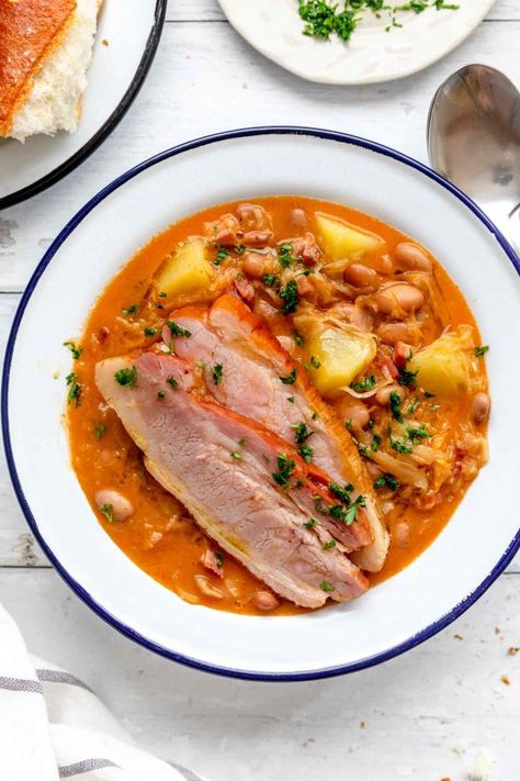 Jota or Sauerkraut Pork and Bean Stew with Potatoes is a tasty recipe for cold days. It's flavorful, comforting, easy to prepare, and a great family meal. Feel free to freeze it for a couple of months or store any leftovers in the fridge. This recipe is great for autumn and winter, especially for batch cooking. #jernejkitchen #slovenianrecipes #sauerkraut #beans #stew Beans Stew, Simple Cake Recipe, Stew With Potatoes, Fluffy Sponge Cake, Espresso Cake, Homemade Sauerkraut, Pork Stew, How To Cook Beans, Bean Stew