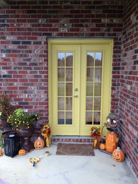 Yellow door red brick Red Door Yellow Door, Bright Front Doors, Yellow Door, Yellow Doors, Red Brick House, Beautiful Patios, Yellow Houses, Patio Landscaping, Red House