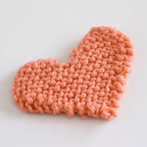 This Easy Knitted Heart Pattern creates a sweet shape that lays flat in garter stitch. It is knitted top-down on straight knitting needles. Begin by making two humps with knitting increases. The middle section is just a few knitted rows. Finish by creating the decrease rows that taper down to the bottom of your heart shape. #StudioKnit #knitheart #knitttedheart Heart Knitting Pattern, Knitted Heart Pattern, Knitting Patterns Free Beginner, Knitted Heart, Knitting Instructions, Knitted Top, Garter Stitch, Top Down, Knitting Techniques