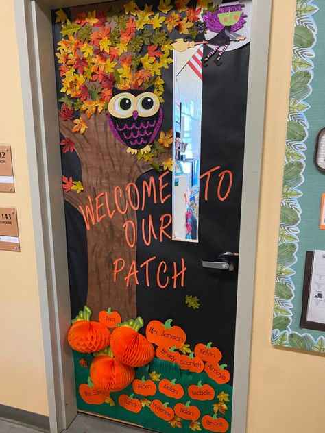 I free handed the tree trunk and used leaves, an owl, witch, and 3D pumpkins from the dollar tree to create a fall themed door. I then used my Silhouette to cut out pumpkins (and their stems) and write the names of the students in pretty font. I used double stick tape and double stick foam to attach everything to the black background paper. Fall Winter Door Decorations Classroom, Fall Doors For Classroom, Tree Classroom Door, Fall Door Ideas, Winter Door Decorations Classroom, Christmas Song Trivia, Fall Classroom Door, Owl Witch, Pretty Font