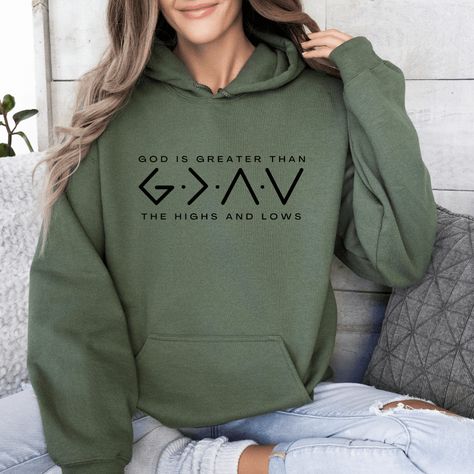 Stop scrolling!  You're going to want this God is Greater Hoodie!  It's soft, warm, and a stylish way to share an encouraging faith-based message about just how great God is! With symbols that represent God is greater than the highs and lows, we added the words just so people know it's not a strange math equation! :)  Whether you're looking for your new favorite Christian sweatshirt for the cooler months to keep you going or a way to share an inspiring message of faith with others, this awesome God Is Greater Than The Highs And Lows Necklaces, God Is Greater Than The Highs And Lows Sweatshirt, God Is Hreater Than The Highs And Lows Tattoo, Bible Verse Hoodies, Christian Sweatshirts, Men’s Christian Hoodies, Faith Apparel, Stop Scrolling, Faith Clothing