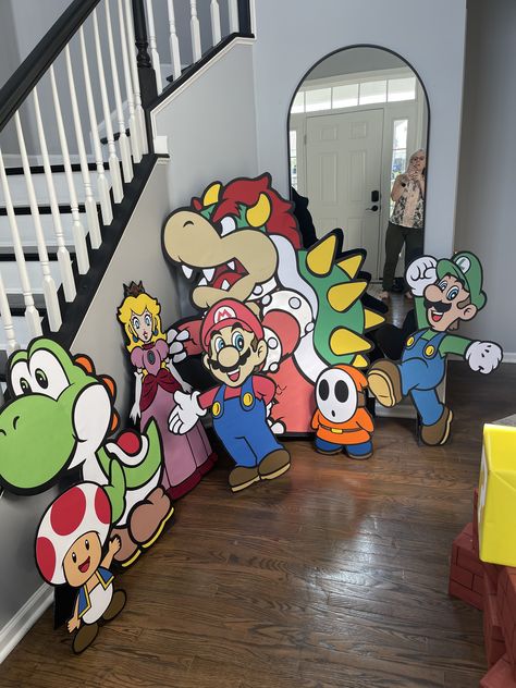 Mario World Party Decor, Diy Rainbow Road Mario, Mario Cart Hallway Decorations, Super Mario Kart Party Ideas, Mario Birthday Diy, Super Mario Obstacle Course, Diy Mario Party Decorations, Nintendo Decorations, Mario Balloon Arch