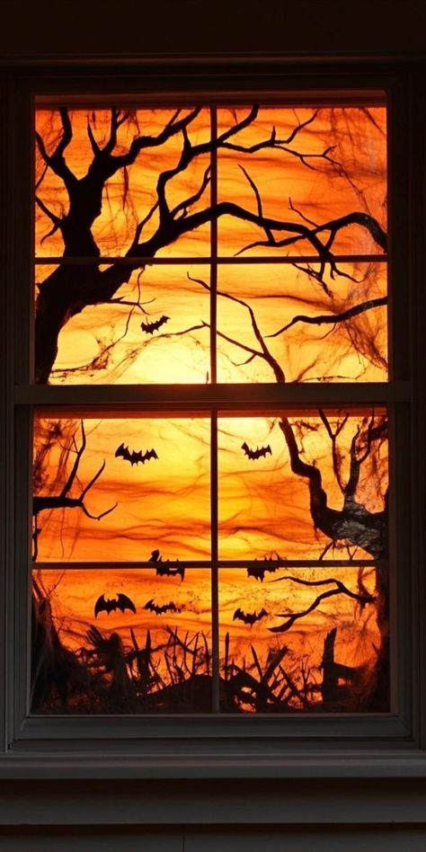 Transform your windows into eerie portals with spine-chilling Halloween decorations. Create shadowy silhouettes of witches, bats, and creepy trees using black construction paper. Hang translucent ghosts that seem to float mid-air. Drape gauzy cobwebs across window frames, dotted with plastic spiders. Use orange string lights to cast a warm, spooky glow. Add a rotating projection light to display moving shadows of supernatural creatures. These window decorations will captivate passersby and set a Halloween Sillouette Art Window, Halloween Witch Silhouette, Diy Halloween Window Decorations, Diy Halloween Window, Halloween Window Display, Orange String Lights, Supernatural Creatures, Halloween Window Decorations, Halloween Office