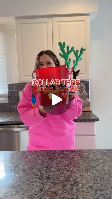 Lauren Engle on Instagram: "Dollar tree jingle basket idea 🎄🎅❤️100% not necessary but so fun for the kids. I got these Santa buckets last year and they are selling them this year too! Everything is from the dollar tree!! I love getting them crafts from the dollar tree so I really just filled it with things I’ll be giving them anyway. It makes it more special when you make it into a basket lol. And the light up cups!??!? How cute!!  I thought it would be fun to do a little giveaway so comment your favorite holiday tradition and I’ll pick 2 people to send coffee money tomorrow ❤️🎄  #dollartree #dollartreefinds #dollartreechristmas #jinglebaskets #momof4 #stayathomemom #christmastradition" Gift Basket Ideas Candy, Wire Gift Basket Ideas, Jingle Baskets For Kids, Christmas Dollar Tree Gifts, Kids Christmas Basket Ideas, Dollar Store Gift Basket Ideas, Jingle Basket, Cup Gift Ideas Filled, Classmate Christmas Gifts