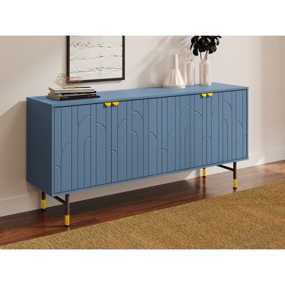 The beautiful sideboard offers a convenient spot to serve charcuterie spreads, store fine China, seasonal table linens, and much more. while its cabinet is ideal for stacking your favorite cookbooks. This simply-chic design blends effortlessly into any casual or formal space. Color: Blue | Wade Logan® Aubreyanna Anaejah Sideboard Grey Wood in Blue, Size 29.3 H x 63.0 W x 15.6 D in | Wayfair Living Room Buffet, Salon Art Deco, Hallway Sideboard, Art Deco Doors, Furniture For Living Room, Real Wood Furniture, Family Room Makeover, Cabinet Table, Art Deco Sideboard