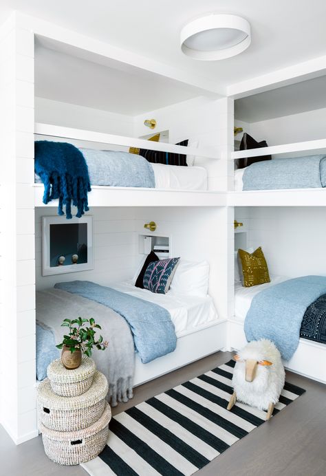 Beachy Minimalism Takes Center Stage in This Breezy Sag Harbor Home Built In Quadruple Bunk Beds, Beach Condo Bunk Room, Beach Bunk Beds, 4 Bunk Beds Built Ins, Bunk Bed Styling, Build In Bunk Beds, 4 Beds In One Room Ideas, Quadruple Bunk Beds, Bunk Room Ideas