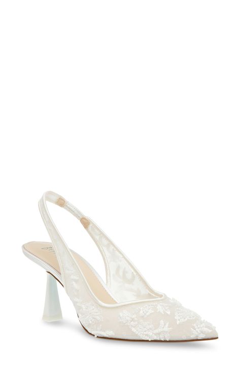 Glossy beads and delicate embroidery enrich the mesh upper of an elegant slingback pump framed by a pointy toe and flare heel. 3" heel Elasticized slingback strap Cushioned footbed Textile upper/synthetic lining and sole Imported Wedding Shoes Bride Lace, Wedding Shoes Chic, Wedding Shoes With Crepe Dress, Wedding Pumps Flat, Wedding Dresses And Shoes, Betsy Johnson Wedding Shoe, Vintage Style Wedding Shoes, Wedding Heels Low Heel, Wedding Shoes Aquazzura