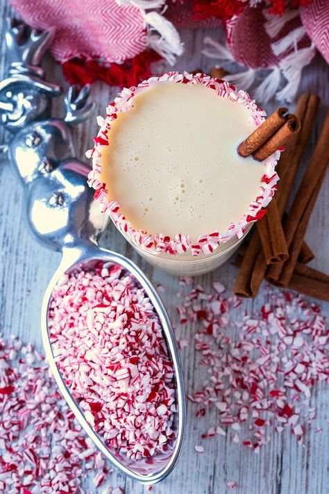 This festive Peppermint Eggnog Cocktail is perfect for your Christmas cocktail party! #christmascocktails #eggnogcocktail #eggnogrecipe #holidaydrinks Peppermint Eggnog Punch, Homemade Spiked Eggnog, Peppermint Eggnog Cocktail, Eggnog Cocktails Rum, Alton Brown Eggnog Recipe, Eggnog Cocktail Recipe, Eggnog Recipe Spiked, Eggnog Cocktail, Eggnog Drinks