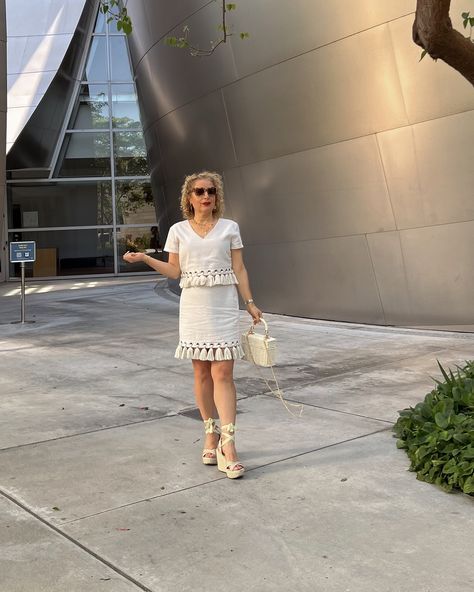 Boho-chic but make it sophisticated: This @lulus beige tassel cropped top and matching tassel skirt, teamed up with lace-up espadrille wedges, make for the ultimate summer outfit. These espadrilles remind me of ones I had in Boston years ago. They’re so comfortable that I walked from Kenmore to Coolidge Corner that summer. How are you styling your boho look? #lulusambassador #lovelulus #BohoChic #TasselTrend #SummerStyle Lace Up Espadrille Wedges, Tassel Skirt, Lace Up Espadrilles, Boho Look, Espadrilles Wedges, In Boston, Cropped Top, Summer Outfit, Boho Chic