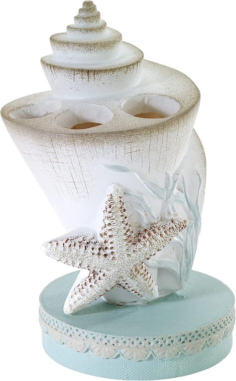 PRICES MAY VARY. 100% Resin INCLUDES: (1) Toothbrush Holder MATERIAL: This artistic design is hand-painted on 100% resin. CARE: Wipe clean only DETAIL: The Farmhouse Shell Collection brings together familiar farmhouse inspirations with seaside icons. Cotton plants, shiplap backgrounds, and lace motif trims are some of the many design details. Figural nautilus shell, with a blue base and other sea creatures in relief. COLLECTION: Mix and match with other Farmhouse Shell accessories including towe Ocean Bathroom Theme, Farmhouse Chic Bathroom, Nautical Decor Bathroom, Small Coastal Bathroom, Ocean Themed Bathroom Decor, Sea Themed Bathroom, Beach Theme Bathroom Decor, Seashell Bathroom, Ocean Themed Bathroom