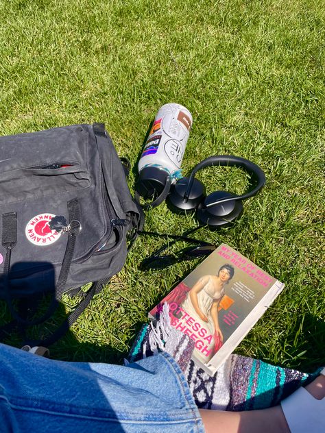 grass book headphones waterbottle jeans birkenstocks fjall raven kanken backpack in black sunglasses picnic casual my year of rest and relaxation reading good book booktok books bluetooth headphones aesthetic Bluetooth Headphones Aesthetic, Raven Kanken Backpack, Kanken Backpack Aesthetic, Fjall Raven Kanken, Year Of Rest And Relaxation, Headphones Aesthetic, Booktok Books, Aesthetic Backpack, My Year