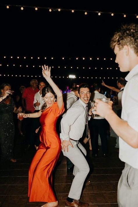 People dancing at an outdoor wedding reception in Florida. | Florida Wedding Photographer Reception Photo Inspiration, Reception Dancing Photos, Backyard Wedding Reception Photos, Wedding Party Dancing, Dancing Wedding Photos, Wedding Guests Photography, Wedding Reception Dancing Photos, Candid Wedding Photos Receptions, Wedding Dancing Photos