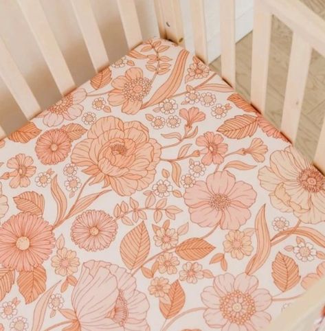 ID: the 3 photos are different angles of a large vintage style floral print with peonies and daisies in peaches and pinks. It is a printed fitted cot sheet tucked into a white cot. Pink Orange Nursery, Peach Baby Room, Peach Nursery Ideas, Pink And Orange Nursery, Peach Baby Nursery, Coral Baby Girl Nursery, Boho Floral Nursery, Peony Poppy, Peach Nursery