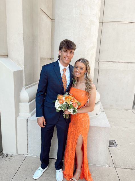 Orange Dress Prom Couple, Orange Prom Dress Aesthetic, Orange Prom Flowers Bouquets, Orange Homecoming Couple, Prom Picture Poses With Bouquet, Prom Flowers Orange Dress, Orange Bouquet Prom, Orange Prom Ideas, Prom Pics With Bouquets