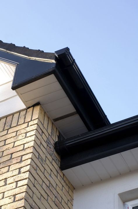 Fascia, soffit, roofline & cladding projects photo gallery Black Soffit, Painting Gutters, Royal Building, Black Metal Roof, Board And Batten Exterior, White Exterior Houses, Home Styles Exterior, Lake Houses Exterior, Contemporary House Exterior