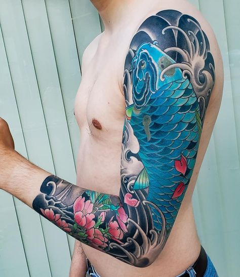 Cole's blue koi. Swipe left for more. Koi Sleeve Tattoo, Sky Tattoo, Japanese Koi Fish Tattoo, Koi Tattoo Sleeve, Japanese Tattoo Artist, Sky Tattoos, Koi Tattoo Design, Blue Koi, Full Sleeve Tattoo Design