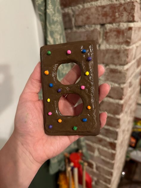 Add some fun to your home with these cosmic brownie lightswitch or outlet covers! Diy Outlet Covers, Light Switch Covers Diy, Dorm Room Crafts, Cosmic Brownies, Outlet Plug, Pastel Home Decor, Switch Socket, Pinterest Diy Crafts, Lamp Switch