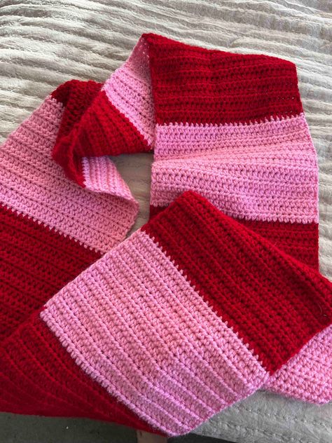 Handmade crochet pink and red striped scarf.  Perfect for winter or chilly fall days. Sustainable and eco-friendly clothing item that will last you years! Waffle Stitch Crochet Scarf, Strawberry Scarf Crochet, Crochet Scarf 2 Color, Crochet Scarf Checkered, Crochet Scarf Pink, Knitting Inspiration Scarf, Winter Crochet Scarf, Striped Scarf Crochet, Cool Crochet Scarf