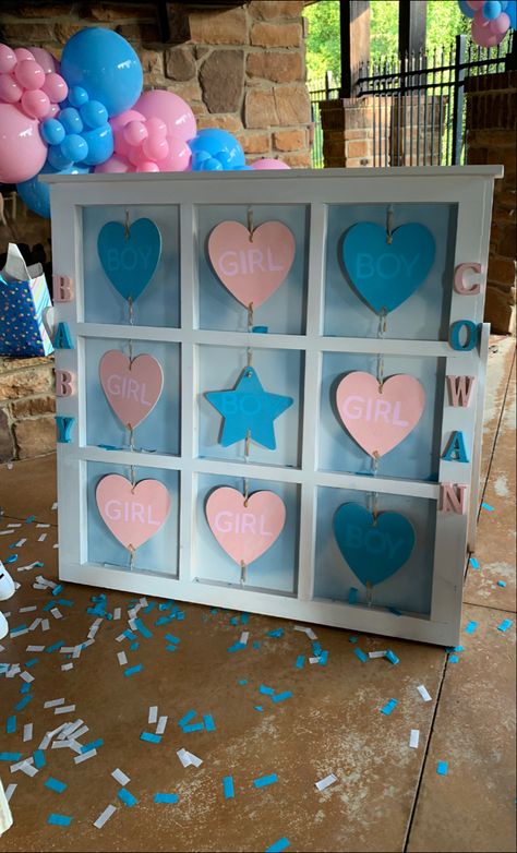 My dad and I created this board for my brother and sister in law’s gender reveal and it turned out great! He made the frame and I handpainted the panels Gender Reveal Tic Tac Toe Board Diy, Gender Reveal Tik Tak Toe Board, Tie Breaker Gender Reveal, Tic Tac Toe Gender Reveal, Gender Keeper, Gender Reveal Candy, Diy Baby Shower Games, Gender Reveal Diy, Baby Surprise Announcement