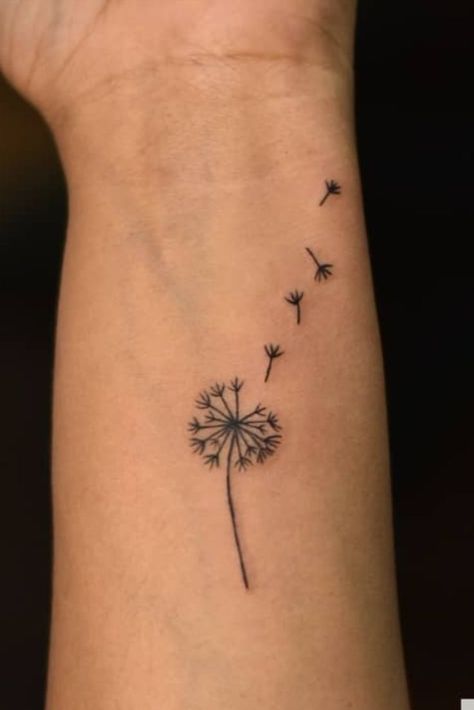 Simple Tatoo Ideas For Girl, Tattoo Designs Dandelion, Simple Like Work Tattoo, Dandelion Wrist Tattoos For Women, Small Happy Tattoos, Dandelion Heart Tattoo, Books Inspired Tattoos, Small Dandelion Tattoo Wrist Simple, Dandelion Tattoo On Wrist